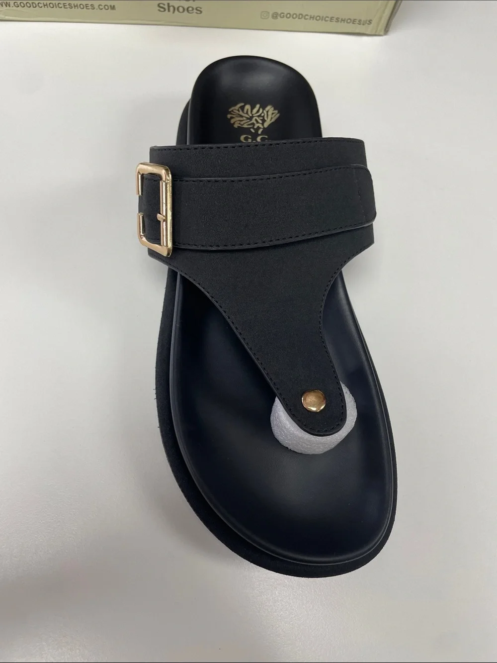 Women’s Black Thong Sandals with Gold Buckle Accent
